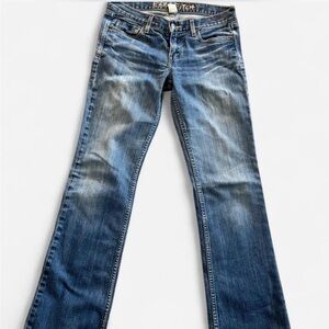 Light blue wash denim flare low rise jeans.